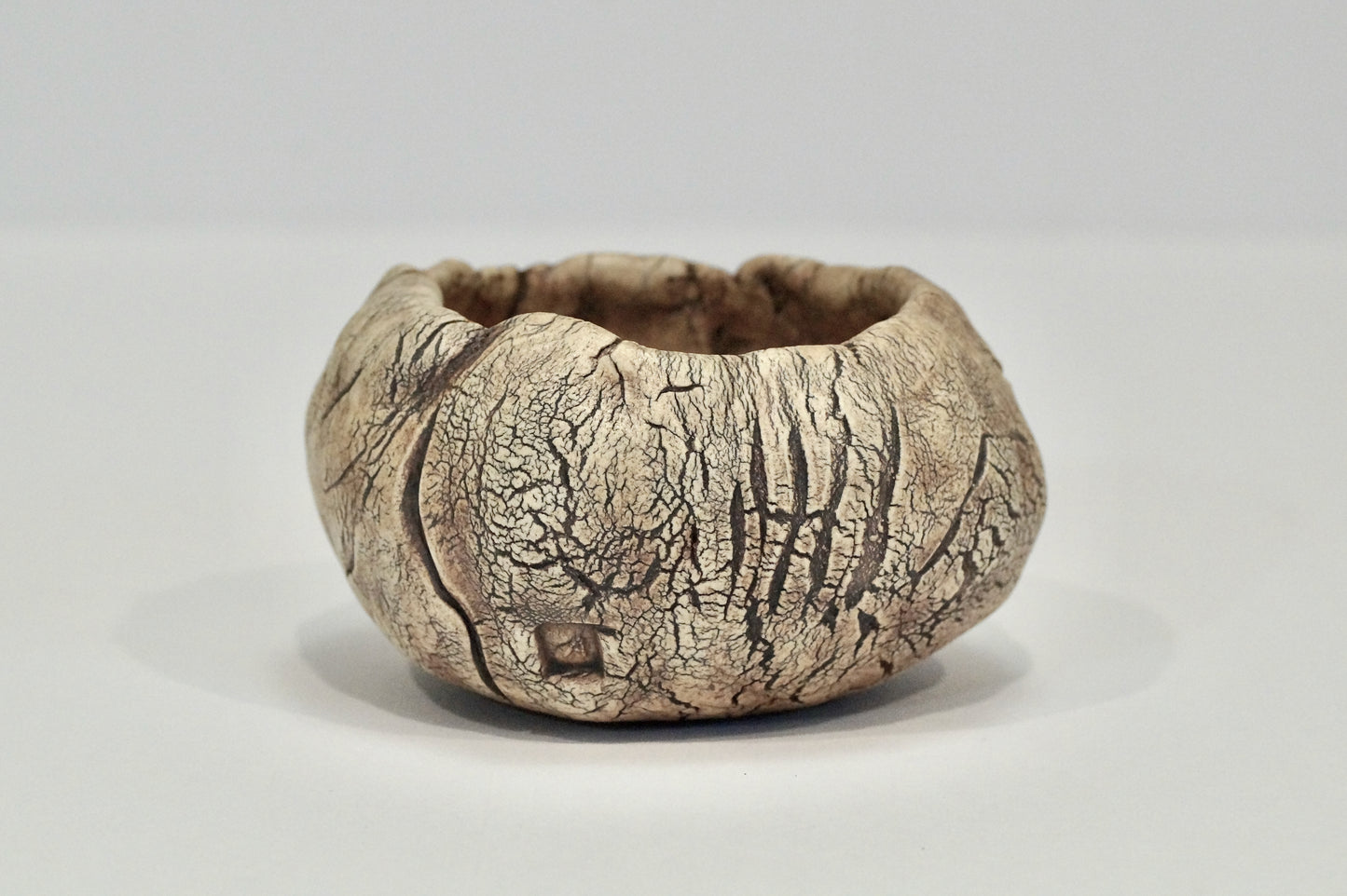 Planter with iron oxide wash