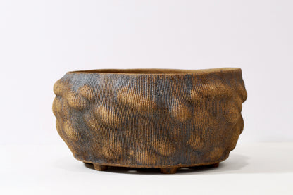 Planter with iron oxide wash