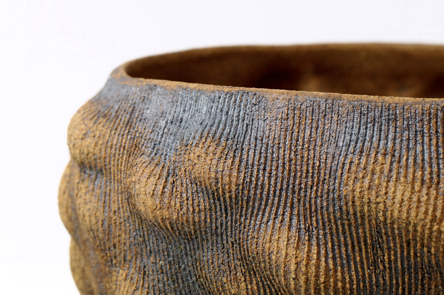 Planter with iron oxide wash