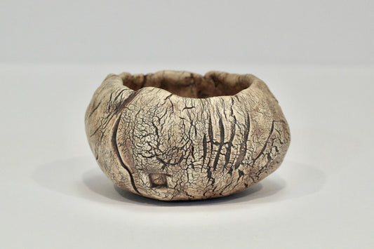 Planter with iron oxide wash